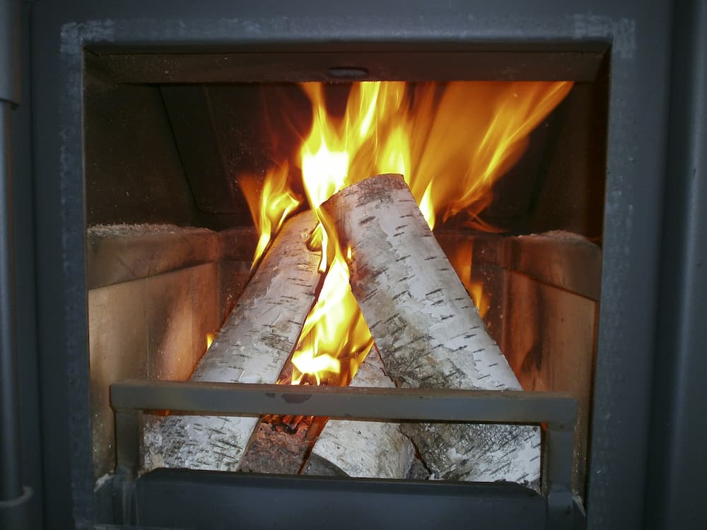 Logs burning in an open fire