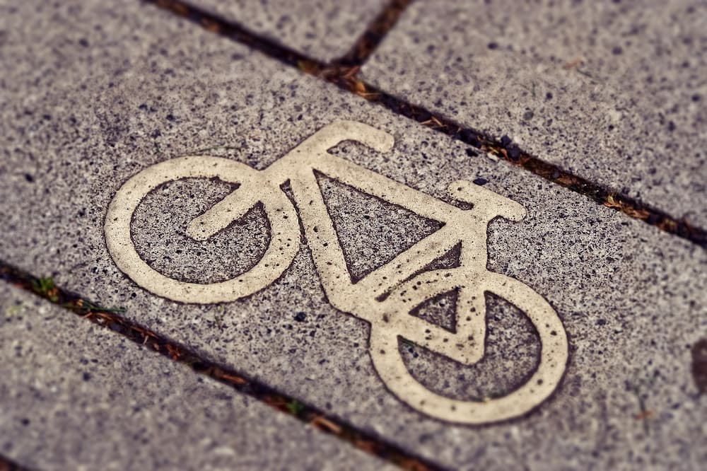 A cycle path sign on a pavement