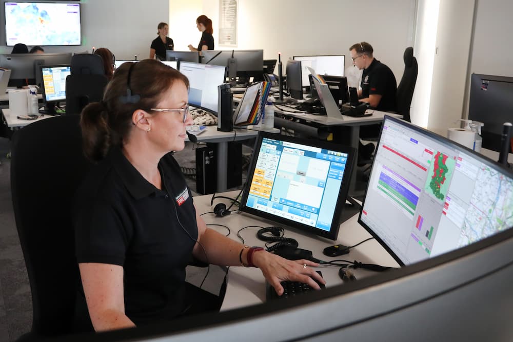 A fire control operator working at their desk
