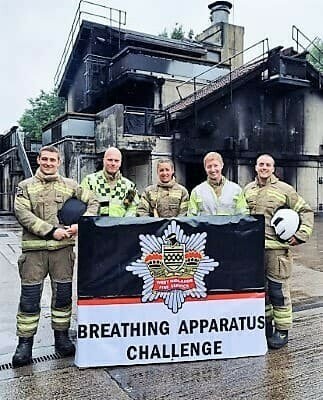 Five firefighters from Foleshill Red watch stand outside our fire house in which they competed in and won our annual breathing apparatus challenge