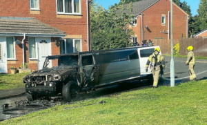 A photo showing how half of the limo was damaged by fire