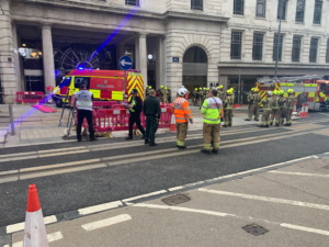 Various emergency services personnel and vehicles on Bull Street.