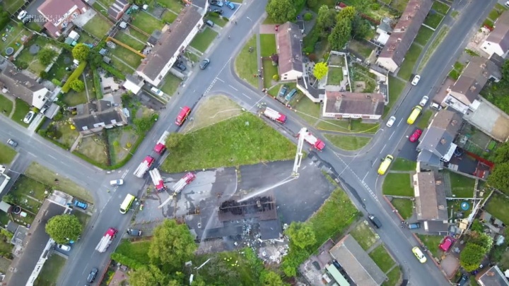 Aerial view of fire engines at an incident in a residential area