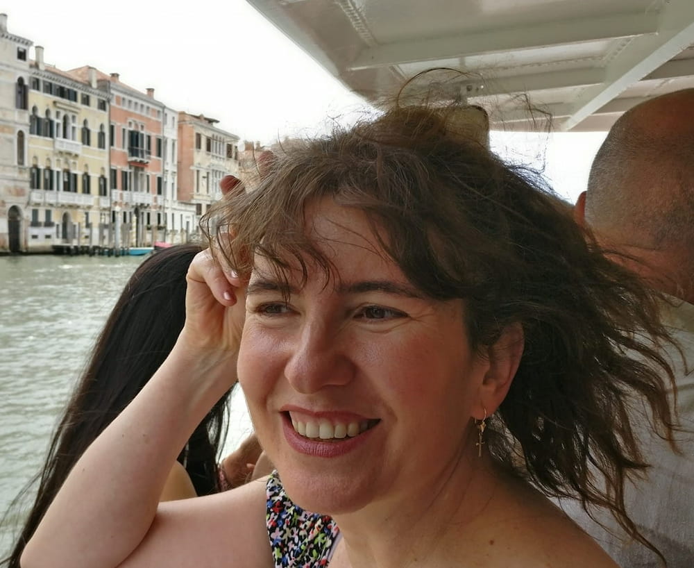 Dr Liliana Judge smiling while on a boat