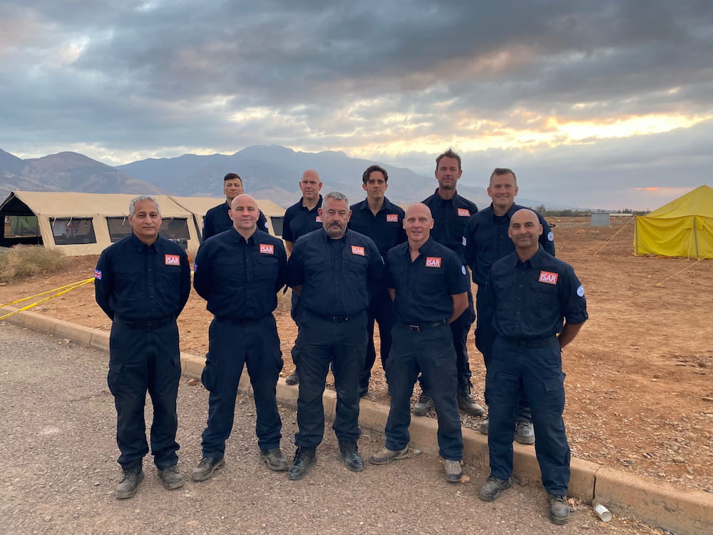 The UKISAR team members from WMFS stood together in Morocco