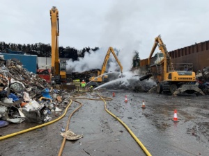 A picture shows the scene of the scrapyard fire in Tipton on Thursday morning (12 October)