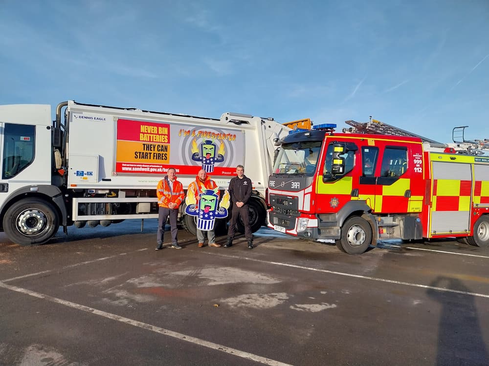 A West Midlands Fire Engine alongside a Sandwell/Serco waste disposal truck