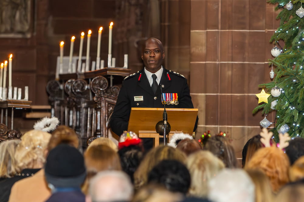 Chief Fire Officer Wayne Brown addresses the congregation at our Carol Concert at St Martin in the Bull Ring